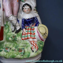 Load image into Gallery viewer, Antique STAFFORDSHIRE Figurine. Rarer Modelled Group: A Huntsman and Little Seated Girl. Excellent Condition. 10 1/4 inches high
