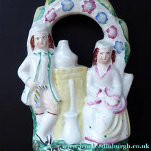 Load image into Gallery viewer, ANTIQUE Victorian Staffordshire Figurine. Small Flatback Model of a Man and Woman at a Water Well
