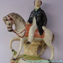 Load image into Gallery viewer, Rare Pair of STAFFORDSHIRE FIGURES. The Prince and Princess of Wales on Horseback
