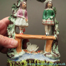 Load image into Gallery viewer, Miniature Staffordshire Flatback Figurine. Couple in a Bough with Swan and Bridge
