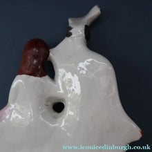 Load image into Gallery viewer, ANTIQUE Victorian Staffordshire Flatback Figurine. A Highlander and his Sweetheart Sitting on a Clock Face. Poor Man's Clock
