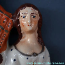 Load image into Gallery viewer, ANTIQUE Victorian Staffordshire Flatback Figurine. A Highlander and his Sweetheart Sitting on a Clock Face. Poor Man's Clock
