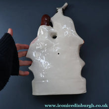 Load image into Gallery viewer, ANTIQUE Victorian Staffordshire Flatback Figurine. A Highlander and his Sweetheart Sitting on a Clock Face. Poor Man's Clock
