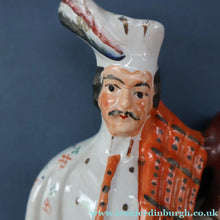 Load image into Gallery viewer, ANTIQUE Victorian Staffordshire Flatback Figurine. A Highlander and his Sweetheart Sitting on a Clock Face. Poor Man's Clock
