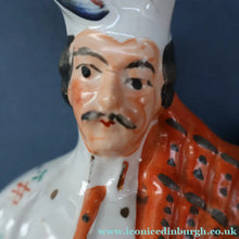 Load image into Gallery viewer, ANTIQUE Victorian Staffordshire Flatback Figurine. A Highlander and his Sweetheart Sitting on a Clock Face. Poor Man's Clock
