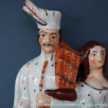 Load image into Gallery viewer, ANTIQUE Victorian Staffordshire Flatback Figurine. A Highlander and his Sweetheart Sitting on a Clock Face. Poor Man's Clock
