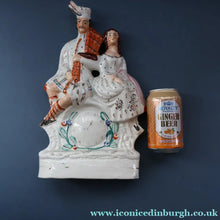 Load image into Gallery viewer, ANTIQUE Victorian Staffordshire Flatback Figurine. A Highlander and his Sweetheart Sitting on a Clock Face. Poor Man's Clock
