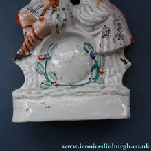 Load image into Gallery viewer, ANTIQUE Victorian Staffordshire Flatback Figurine. A Highlander and his Sweetheart Sitting on a Clock Face. Poor Man's Clock
