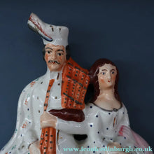 Load image into Gallery viewer, ANTIQUE Victorian Staffordshire Flatback Figurine. A Highlander and his Sweetheart Sitting on a Clock Face. Poor Man's Clock

