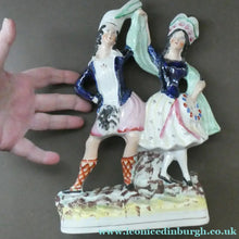 Load image into Gallery viewer, ANTIQUE Victorian Staffordshire Flatback Figurine. A Highlander and his Sweetheart Dancing. 10 inches
