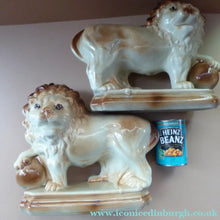 Load image into Gallery viewer, LARGE PAIR of ANTIQUE Staffordshire Style Medici Lions with front paw on ball. 14 inches in length
