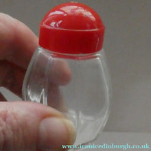 Load image into Gallery viewer, Vintage 1950s Red Plastic Atomic / Space Age Cruet Set with Stand
