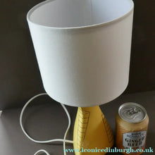 Load image into Gallery viewer, Vintage 1950s Pottery Table Lamp with White Drum Shade. Yellow Triangular Shape with Gold Decoration
