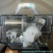 Load image into Gallery viewer, Made in Ireland Wall Clock Hanson or Hansco. Vintage Orange and Brown Plastic

