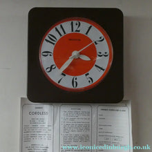 Load image into Gallery viewer, Made in Ireland Wall Clock Hanson or Hansco. Vintage Orange and Brown Plastic
