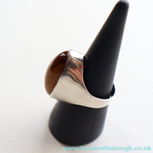 Load image into Gallery viewer, Vintage 1977 Hallmarked Space Age Silver Rings with Oval Tiger's Eye Inclusion. Size O

