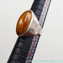Load image into Gallery viewer, Vintage 1977 Hallmarked Space Age Silver Rings with Oval Tiger's Eye Inclusion. Size O
