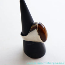 Load image into Gallery viewer, Vintage 1977 Hallmarked Space Age Silver Rings with Oval Tiger's Eye Inclusion. Size O
