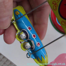Load image into Gallery viewer, Products Vintage 2000 SCHYLLING Rocket Ride Carousel. Tin Plate Clockwork. Rotating Rockets. BOXED

