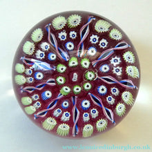 Load image into Gallery viewer, Vintage JOHN DEACONS Paperweight Cranberry Glass Ground, Millefiori Canes &amp; Nine Half Spokes. StK Cane
