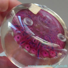 Load image into Gallery viewer, Vintage JOHN DEACONS Paperweight Cranberry Glass Ground, Millefiori Canes &amp; Nine Half Spokes. StK Cane
