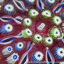 Load image into Gallery viewer, Vintage JOHN DEACONS Paperweight Cranberry Glass Ground, Millefiori Canes &amp; Nine Half Spokes. StK Cane

