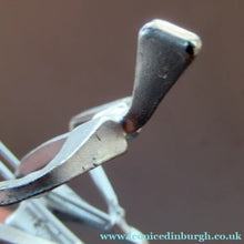 Load image into Gallery viewer, Scottish Horseshoe Nail Sculpture of a Skiing Man
