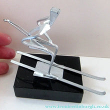 Load image into Gallery viewer, Scottish Horseshoe Nail Sculpture of a Skiing Man
