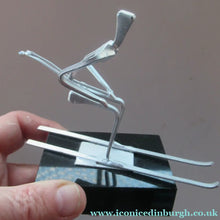Load image into Gallery viewer, Scottish Horseshoe Nail Sculpture of a Skiing Man
