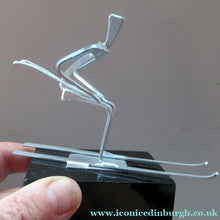 Load image into Gallery viewer, Scottish Horseshoe Nail Sculpture of a Skiing Man

