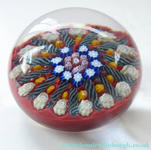 Load image into Gallery viewer, Vintage Scottish Paperweight VASART GLASS. Red Ground with Thirteen Spokes and Millefiori Canes

