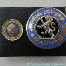 Load image into Gallery viewer, Vintage White Metal Celtic Style Brooch with Lion Rampant Motif, Thistle Motifs and Blue Enamel
