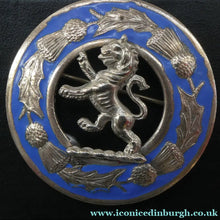 Load image into Gallery viewer, Vintage White Metal Celtic Style Brooch with Lion Rampant Motif, Thistle Motifs and Blue Enamel
