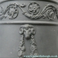 Load image into Gallery viewer, WEDGWOOD Edwardian Black Basalt Spill Vase with Ancanthus Scolls, Garlands, Ram's Head Mask. Height 8 1/2 inches
