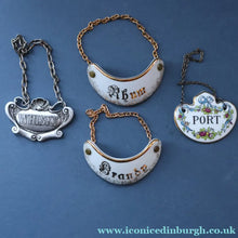 Load image into Gallery viewer, Wee Job Lot: Four Vintage Bottle Labels. The Port One is Coalport. Two Limoges &amp; One White Metal Whisky

