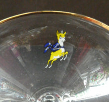 Load image into Gallery viewer, Set of Four Vintage Matching 1970s BABYCHAM Coupe or Saucer Shape Glasses - with Brighter Yellow Bambi Motif
