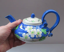 Load image into Gallery viewer, SCOTTISH POTTERY. Rare MakMerry Hand-Painted Teapot with White Prunus Blossoms and Blue Background. Rare Piece in Good Antique Condition
