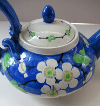 Load image into Gallery viewer, SCOTTISH POTTERY. Rare MakMerry Hand-Painted Teapot with White Prunus Blossoms and Blue Background. Rare Piece in Good Antique Condition
