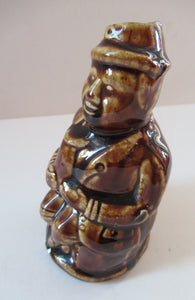 Antique 19th Century Treacle Glazed SCOTTISH POTTERY Money Box or Bank in the Form of a Seated Gentleman