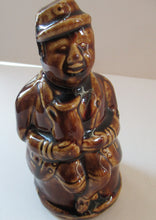 Load image into Gallery viewer, Antique 19th Century Treacle Glazed SCOTTISH POTTERY Money Box or Bank in the Form of a Seated Gentleman
