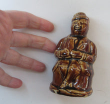 Load image into Gallery viewer, Antique 19th Century Treacle Glazed SCOTTISH POTTERY Money Box or Bank in the Form of a Seated Gentleman

