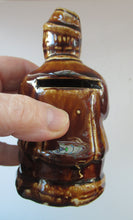 Load image into Gallery viewer, Antique 19th Century Treacle Glazed SCOTTISH POTTERY Money Box or Bank in the Form of a Seated Gentleman
