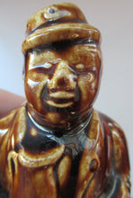 Load image into Gallery viewer, Antique 19th Century Treacle Glazed SCOTTISH POTTERY Money Box or Bank in the Form of a Seated Gentleman
