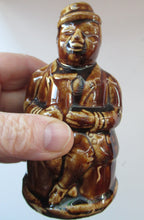 Load image into Gallery viewer, Antique 19th Century Treacle Glazed SCOTTISH POTTERY Money Box or Bank in the Form of a Seated Gentleman
