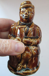Antique 19th Century Treacle Glazed SCOTTISH POTTERY Money Box or Bank in the Form of a Seated Gentleman