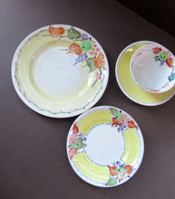 Load image into Gallery viewer, SCOTTISH POTTERY.  Vintage 1920s Hand Painted MAK MERRY Pottery Trio. Cup, Saucer and Side Plate and Another Larger Plate
