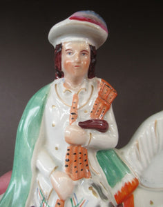 Antique Staffordshire on Scottish Horseman Playing the Bagpipes