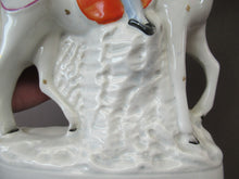 Load image into Gallery viewer, Antique Staffordshire on Scottish Horseman Playing the Bagpipes
