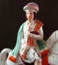 Load image into Gallery viewer, Antique Staffordshire on Scottish Horseman Playing the Bagpipes
