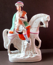 Load image into Gallery viewer, Antique Staffordshire on Scottish Horseman Playing the Bagpipes
